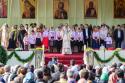 La sfârșitul Sfintei Liturghii din 14 octombrie 2014 (la Iași), Dlui Neculai Popa, respectiv Dnei Georgeta Popa din Roznov, vrednicii părinţi a 13 copii, le-au fost acordate, de către Părintele Patriarh Daniel, Ordinul „Sfinţii Martiri Brâncoveni”, respectiv Ordinul „Crucea Maria Brâncoveanu”. Distincțiile le-au fost înmânate de către IPS Părinte Teofan, Mitropolitul Moldovei și Bucovinei. Să faci ce face Popa